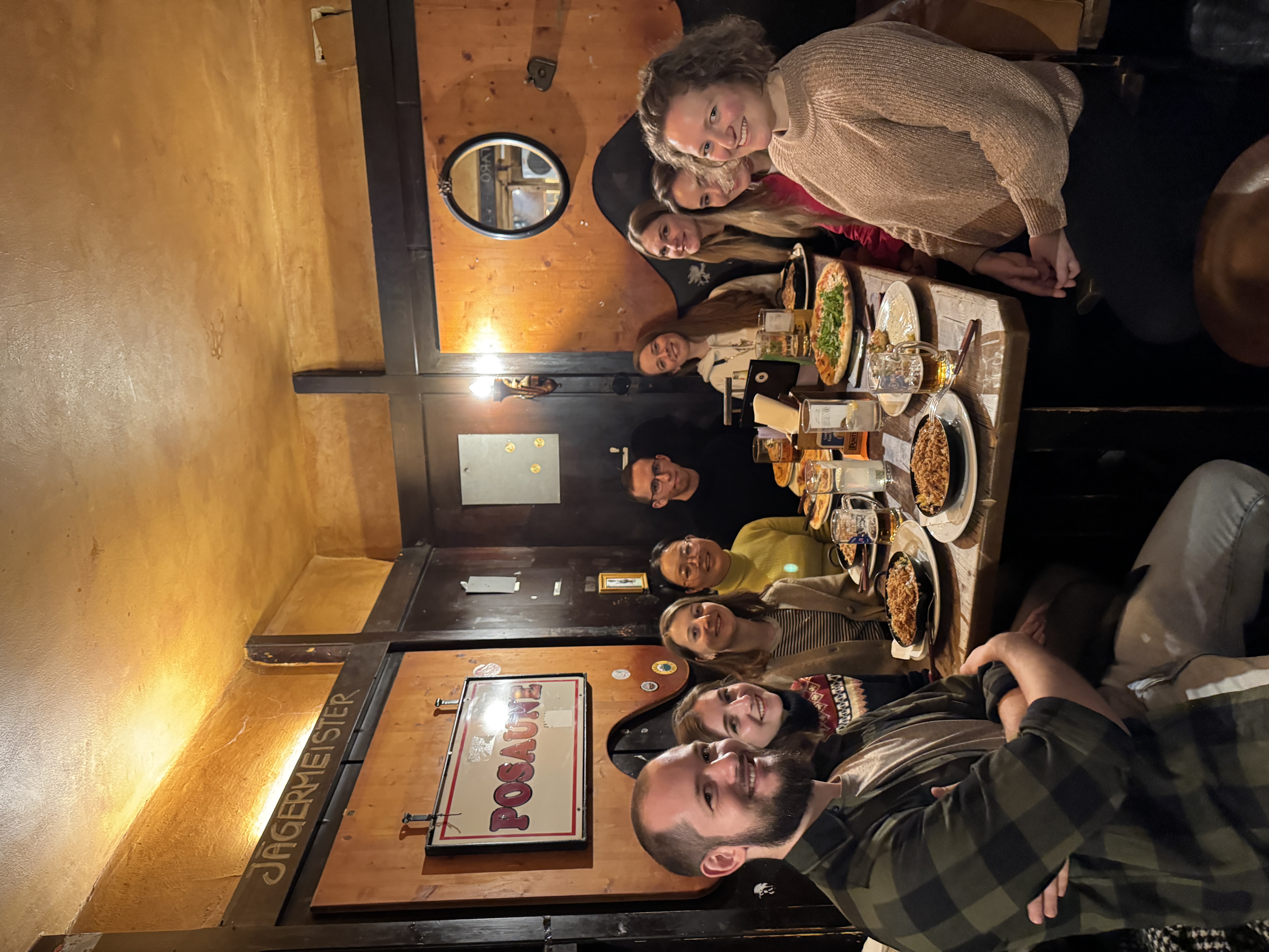 Image of APMA members enjoying delicious food at Posaune.